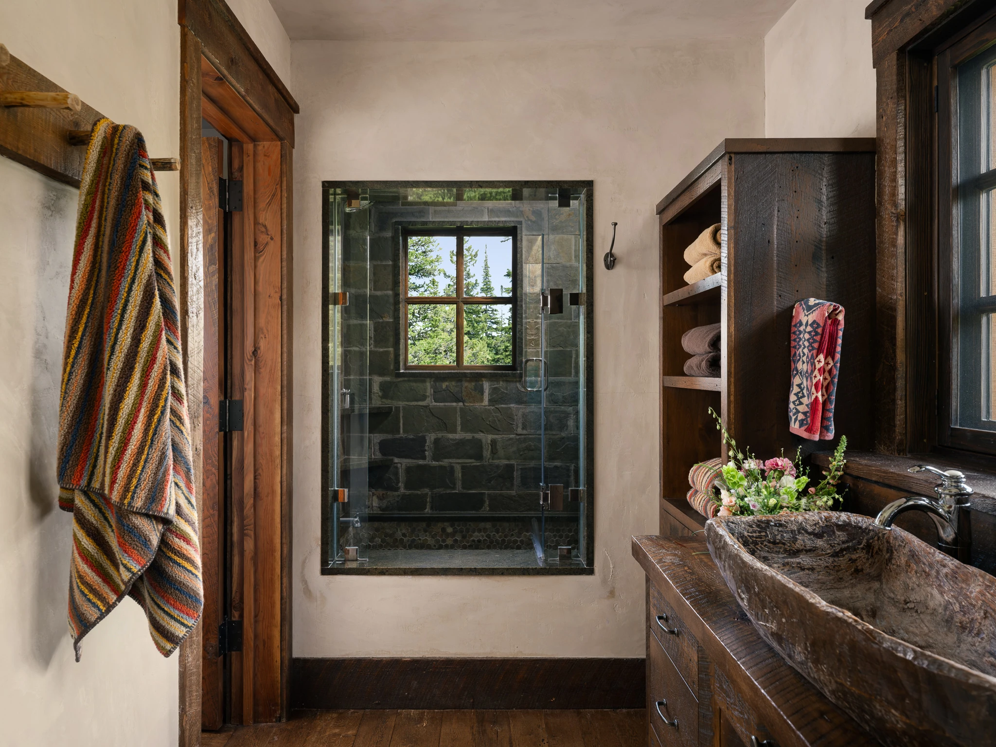 Guest bedroom with log headboards — interior design photography Big Sky Montana, Club Ridge